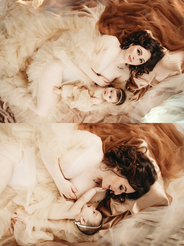 A mother and child taking photos together, showing a parent's bond through the lens of an indoor boudoir family portrait session in Portland, Oregon