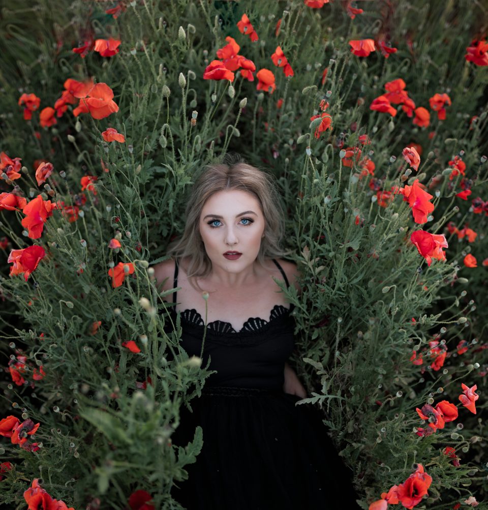 gorgeous senior session in field of flowers Oregon