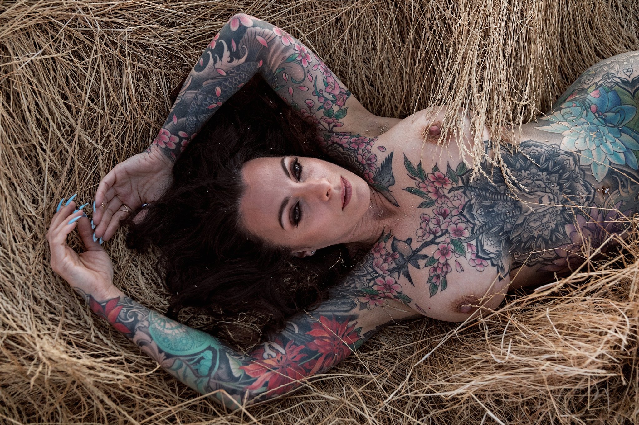 boudoir in the field tattooed brunette