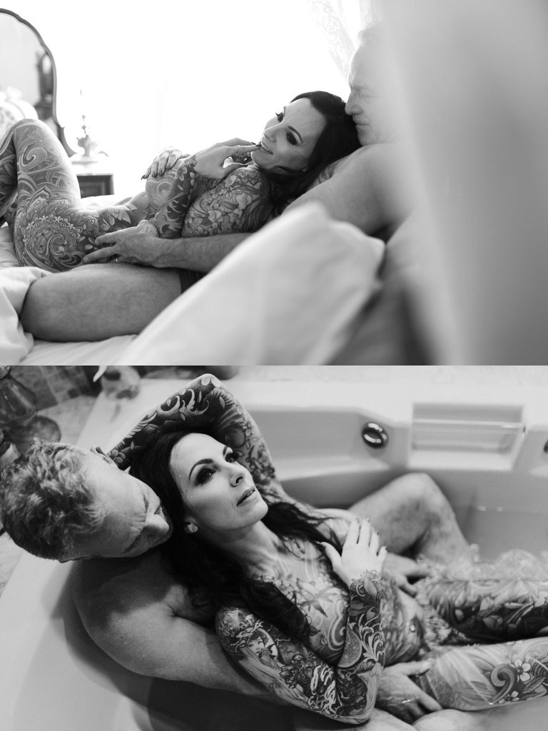 couple taking bath together snuggling in bathtub